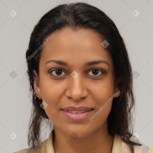 Joyful black young-adult female with medium  brown hair and brown eyes