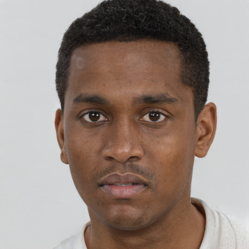 Neutral black young-adult male with short  black hair and brown eyes