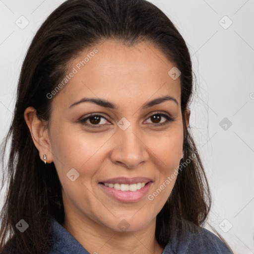 Joyful white adult female with long  brown hair and brown eyes