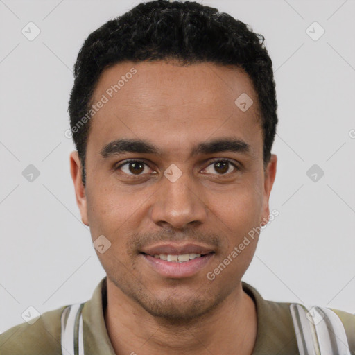 Joyful latino young-adult male with short  black hair and brown eyes