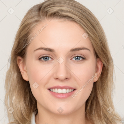 Joyful white young-adult female with long  brown hair and grey eyes