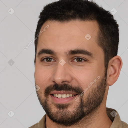 Joyful white young-adult male with short  brown hair and brown eyes