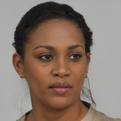 Neutral black young-adult female with short  brown hair and brown eyes