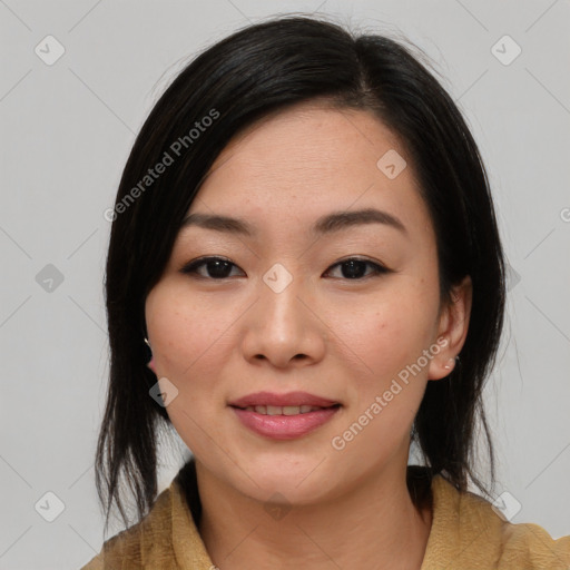 Joyful asian young-adult female with medium  black hair and brown eyes