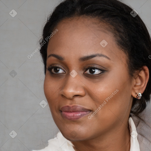 Joyful black young-adult female with medium  brown hair and brown eyes