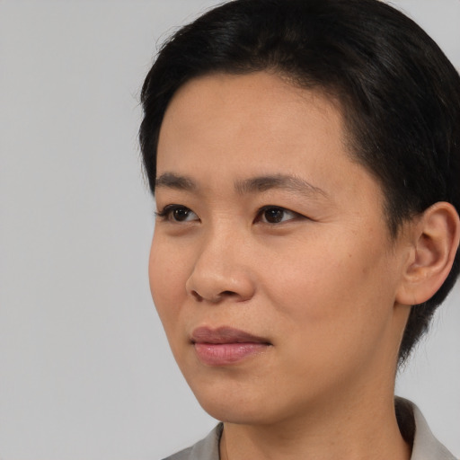Neutral asian young-adult female with short  black hair and brown eyes