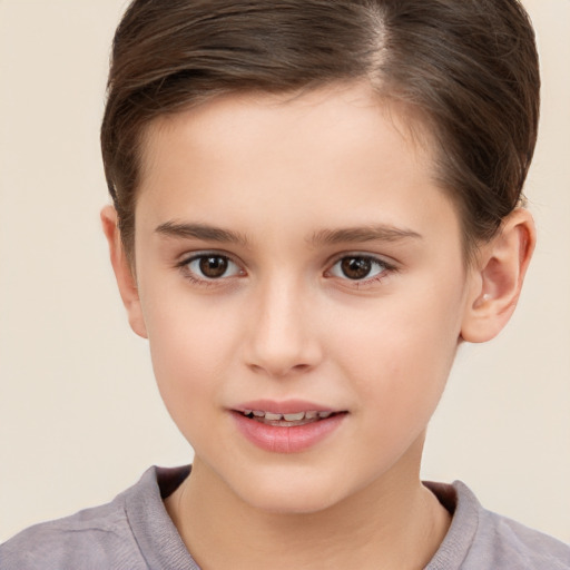 Joyful white child female with short  brown hair and brown eyes