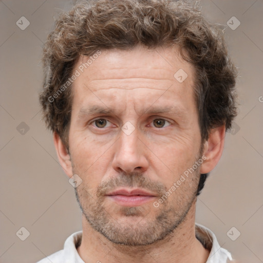 Neutral white adult male with short  brown hair and brown eyes