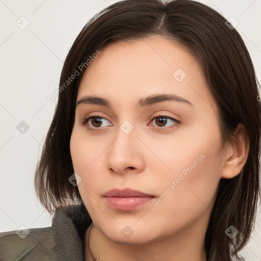 Neutral white young-adult female with long  brown hair and brown eyes