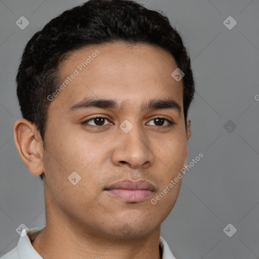 Neutral latino young-adult male with short  brown hair and brown eyes