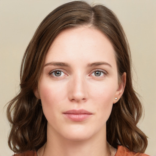 Neutral white young-adult female with medium  brown hair and green eyes