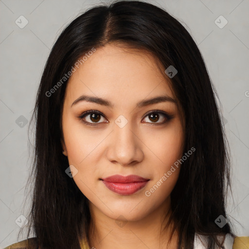 Joyful latino young-adult female with long  brown hair and brown eyes