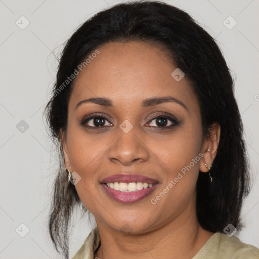 Joyful black young-adult female with medium  brown hair and brown eyes