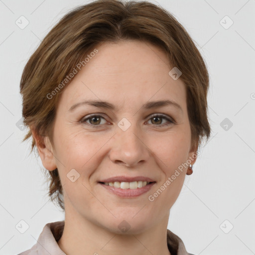 Joyful white adult female with medium  brown hair and grey eyes