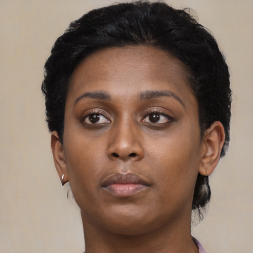 Neutral black young-adult female with short  black hair and brown eyes
