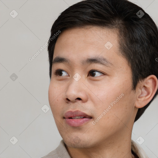 Neutral asian young-adult male with short  black hair and brown eyes