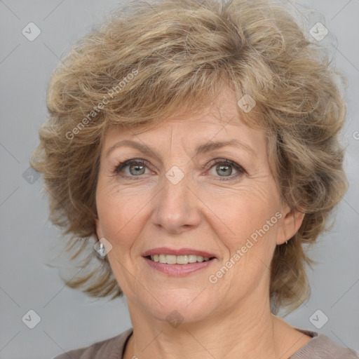 Joyful white middle-aged female with medium  brown hair and brown eyes