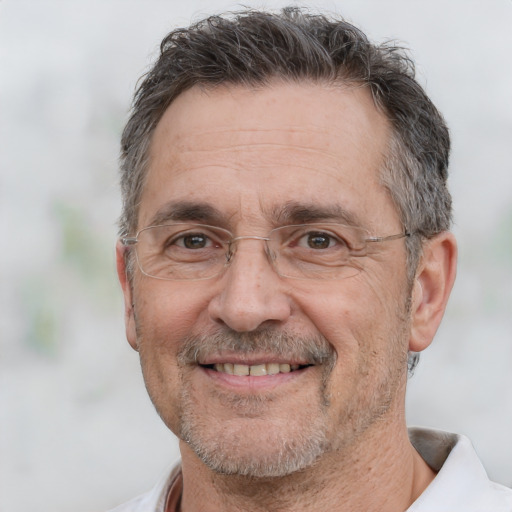 Joyful white middle-aged male with short  brown hair and brown eyes