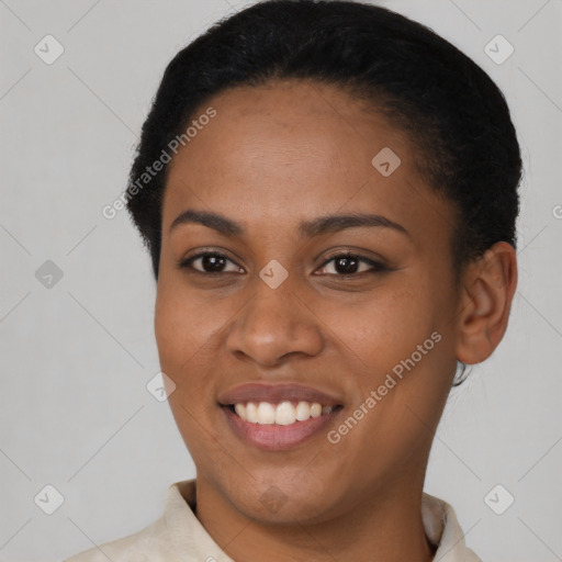 Joyful latino young-adult female with short  black hair and brown eyes