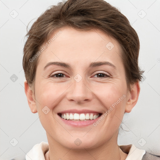 Joyful white young-adult female with short  brown hair and grey eyes