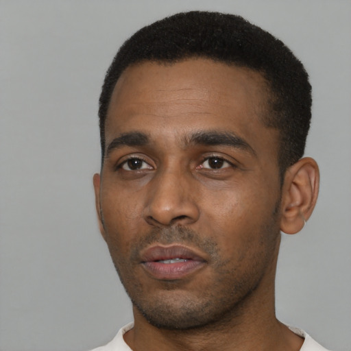 Neutral black young-adult male with short  black hair and brown eyes