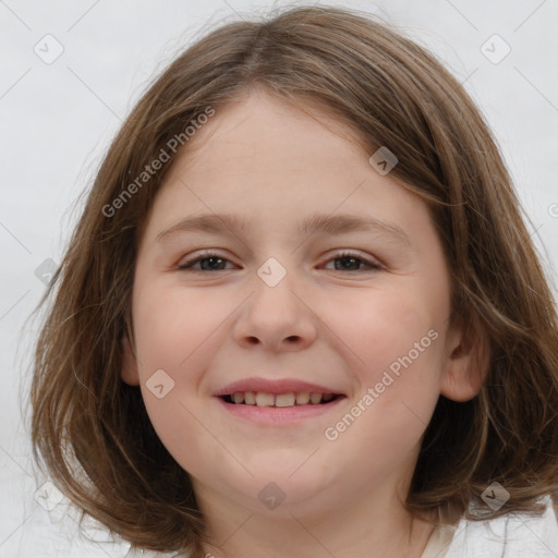 Joyful white child female with medium  brown hair and brown eyes