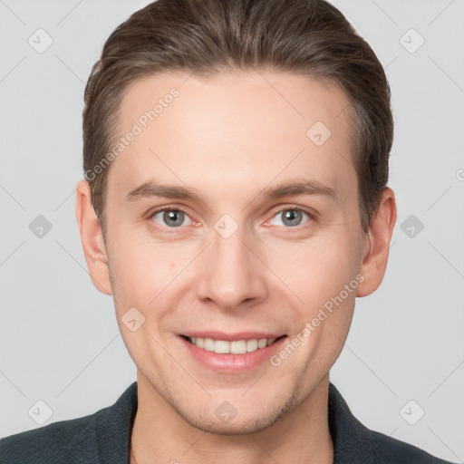 Joyful white adult male with short  brown hair and grey eyes