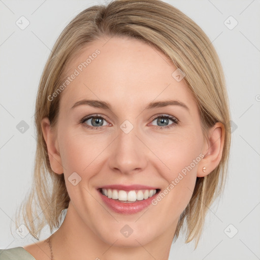 Joyful white young-adult female with medium  brown hair and blue eyes