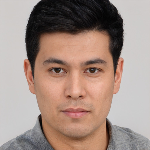 Neutral latino young-adult male with short  brown hair and brown eyes