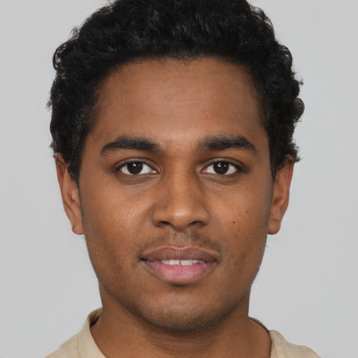 Neutral black young-adult male with short  black hair and brown eyes