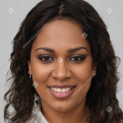 Joyful black young-adult female with long  brown hair and brown eyes