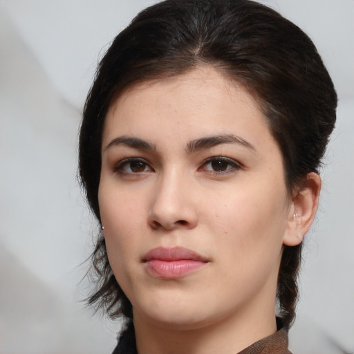 Neutral white young-adult female with medium  brown hair and brown eyes