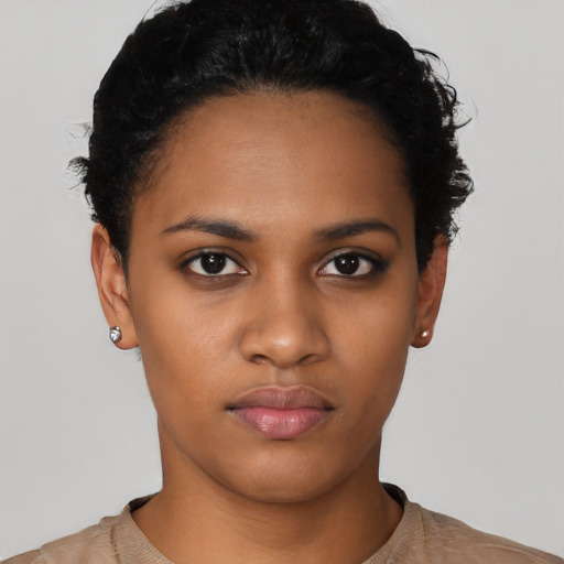 Neutral black young-adult female with short  black hair and brown eyes