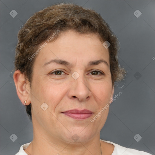 Joyful white adult female with short  brown hair and brown eyes