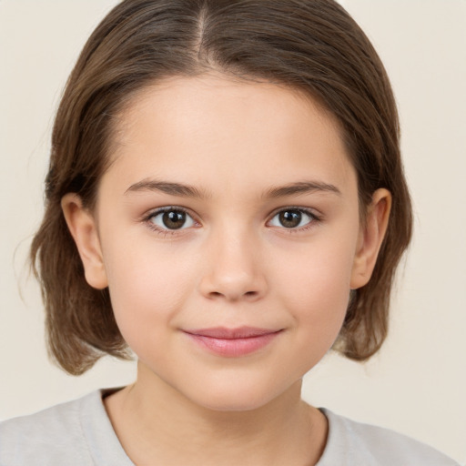 Joyful white child female with medium  brown hair and brown eyes