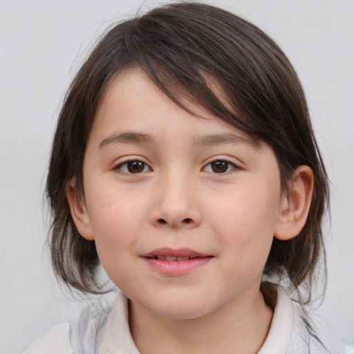 Joyful white child female with medium  brown hair and brown eyes