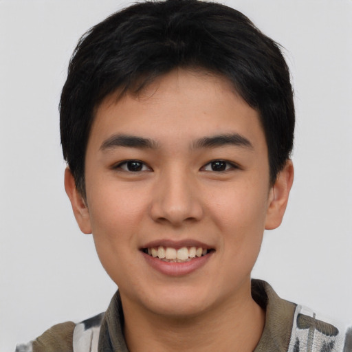 Joyful asian young-adult male with short  brown hair and brown eyes