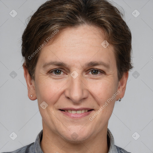 Joyful white adult female with short  brown hair and brown eyes