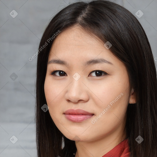 Joyful asian young-adult female with long  brown hair and brown eyes