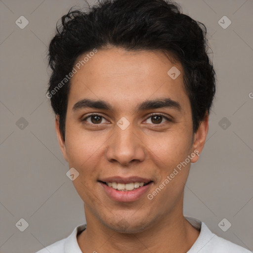 Joyful white young-adult male with short  black hair and brown eyes