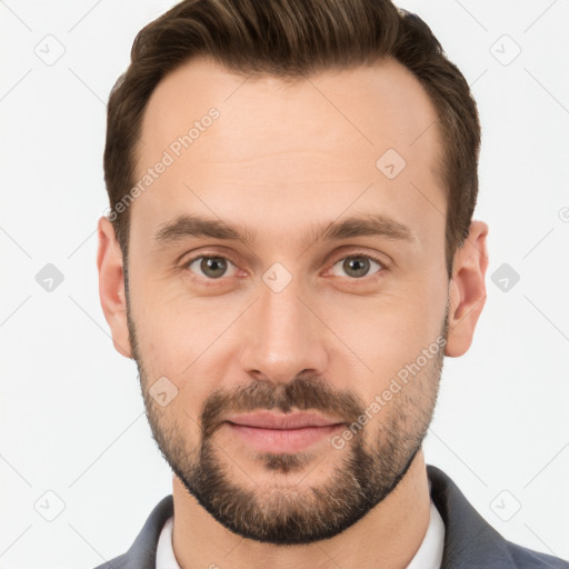 Joyful white young-adult male with short  brown hair and brown eyes