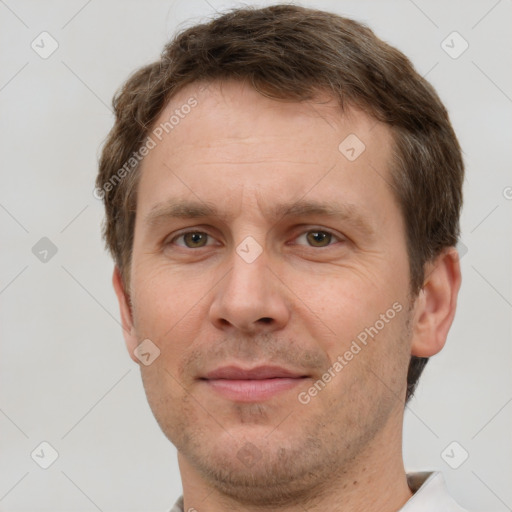 Joyful white adult male with short  brown hair and grey eyes