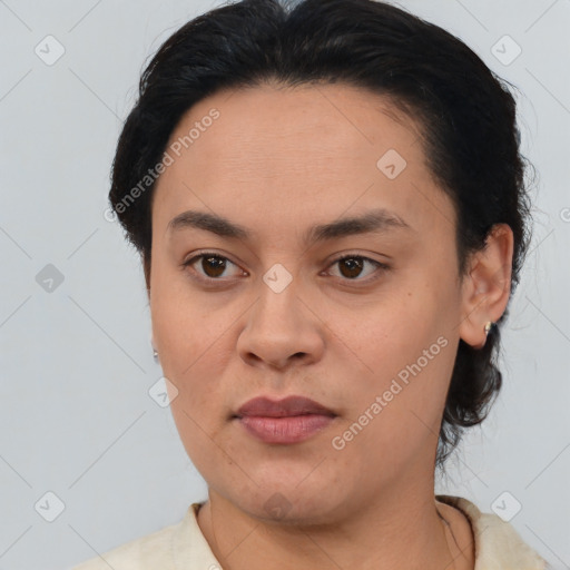 Joyful asian young-adult female with short  brown hair and brown eyes