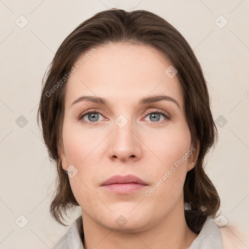 Neutral white young-adult female with medium  brown hair and grey eyes