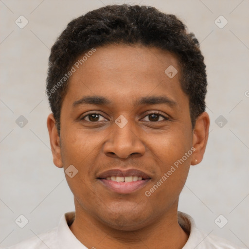 Joyful latino young-adult male with short  brown hair and brown eyes