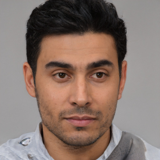 Neutral white young-adult male with short  black hair and brown eyes