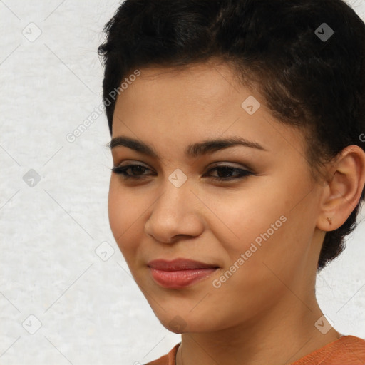 Joyful latino young-adult female with short  brown hair and brown eyes