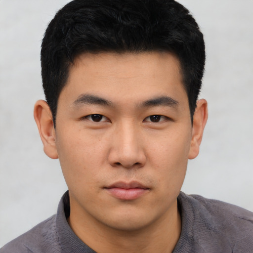 Neutral asian young-adult male with short  black hair and brown eyes