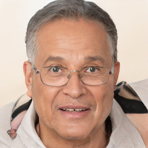 Joyful white middle-aged male with short  gray hair and brown eyes