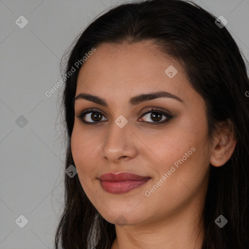 Joyful white young-adult female with long  brown hair and brown eyes